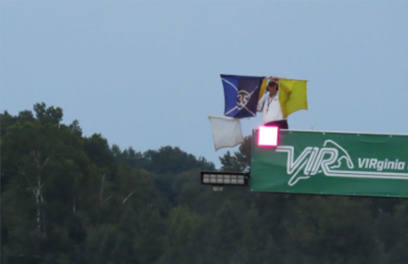 Trackside LED sign board showing course conditions